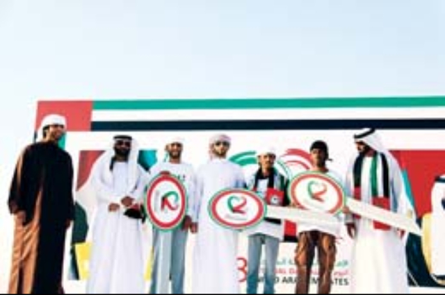 Majid and Mansour Bin Mohammed attend National Day of Camels