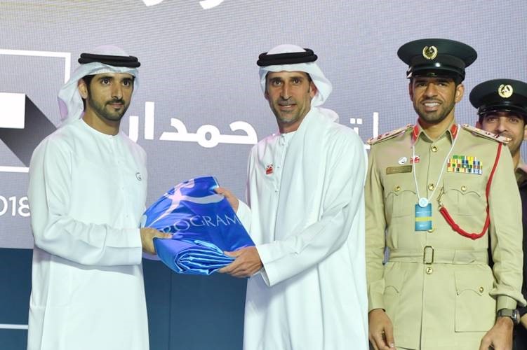 Dubai Crown Prince hands over Hamdan bin Mohammed Program for Smart Government Flag to Dubai Police