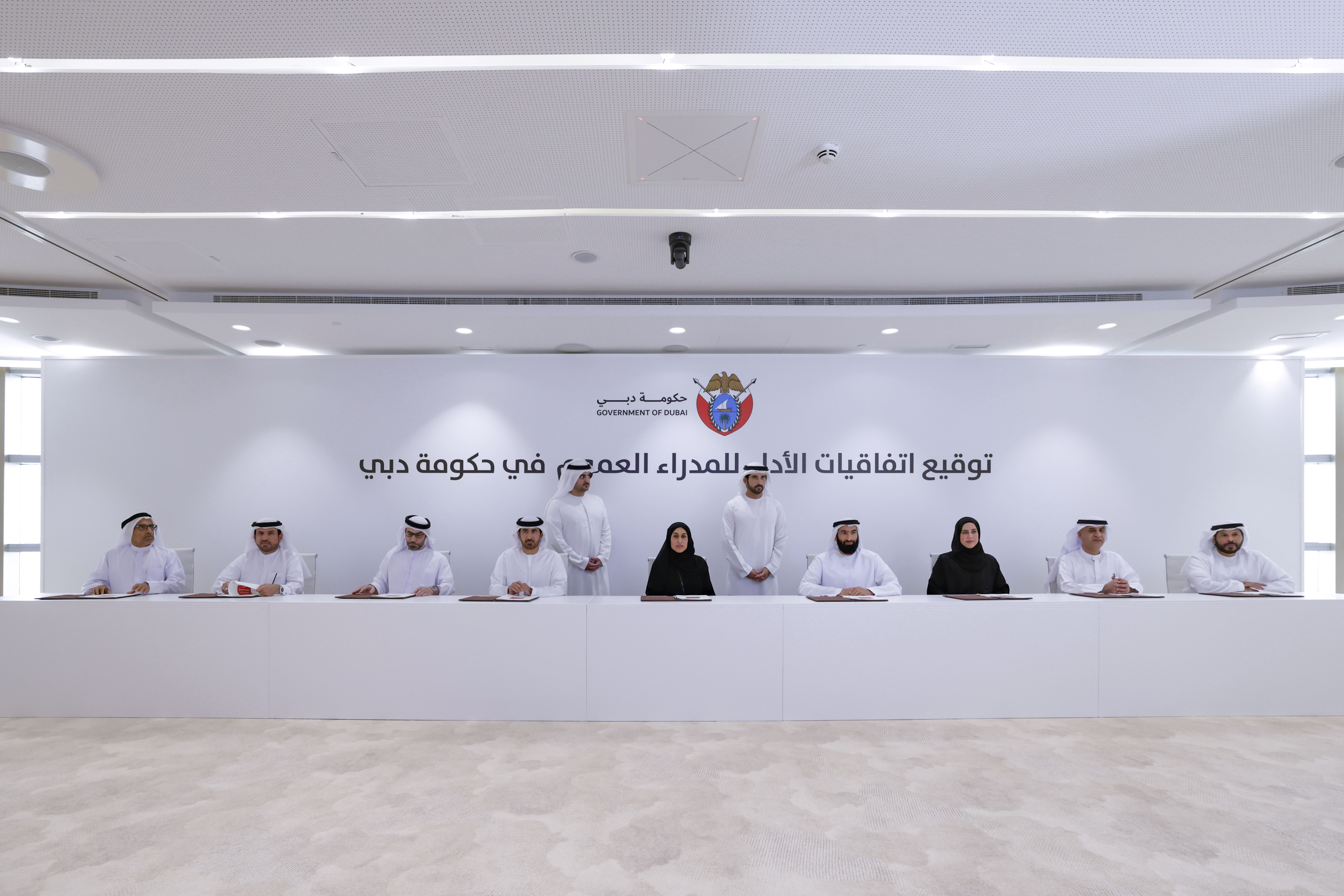 Hamdan bin Mohammed and Maktoum bin Mohammed attend signing of performance agreements by senior public officials