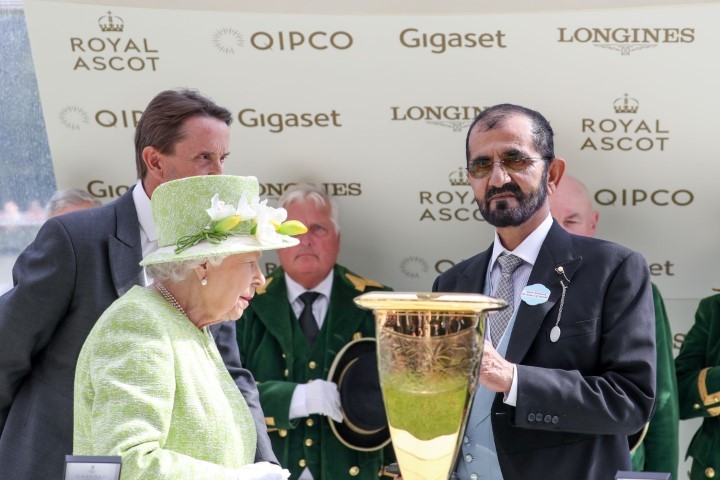 Mohammed bin Rashid receives trophy from Queen Elizabeth II on historic Royal Ascot win
